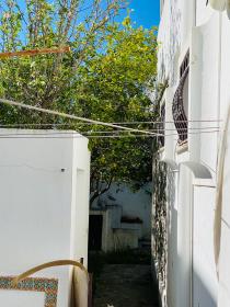Casa de piedra cerca de la playa en zona residencial